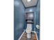 Small bathroom with a toilet and storage cabinet at 65 Centerport Dr, White, GA 30184
