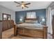 King-size bed in a nicely decorated bedroom at 65 Centerport Dr, White, GA 30184