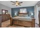 King-size bed in a nicely decorated bedroom at 65 Centerport Dr, White, GA 30184