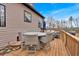 Deck with patio furniture and fire pit at 65 Centerport Dr, White, GA 30184