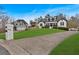 Two-story house with white exterior and black accents at 65 Centerport Dr, White, GA 30184