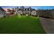 Two-story house with white exterior and black accents at 65 Centerport Dr, White, GA 30184