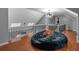 Open loft overlooking lower level with hardwood floors at 65 Centerport Dr, White, GA 30184