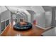 Spacious loft area with hardwood floors and large beanbag chair at 65 Centerport Dr, White, GA 30184
