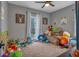 Bright playroom with toys, seating, and large window at 65 Centerport Dr, White, GA 30184