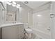 Bathroom featuring a shower, toilet, vanity sink, and wood-look floors at 1131 Orr Rd, Jonesboro, GA 30238