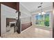Bright dining room with backyard views, seamlessly connects to the living area featuring a fireplace at 1131 Orr Rd, Jonesboro, GA 30238
