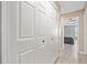 Hallway closet doors with view to room with bed and ceiling fan at 1131 Orr Rd, Jonesboro, GA 30238