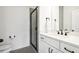 Small bathroom with a frameless shower and vanity at 6829 Crescendo Ct, Atlanta, GA 30328