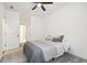 Spacious bedroom with gray carpet and ceiling fan at 6829 Crescendo Ct, Atlanta, GA 30328