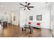 Light and airy living room with hardwood floors, a ceiling fan, and comfortable seating at 6829 Crescendo Ct, Atlanta, GA 30328