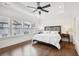 Main bedroom with hardwood floors and large windows at 6829 Crescendo Ct, Atlanta, GA 30328