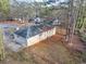 Back of house view, showing a large yard and trees at 1430 Wisdom Way, Austell, GA 30106