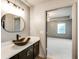 Stylish bathroom with a unique vessel sink and access to the spacious bedroom at 3236 Tallon Sw Ln, Atlanta, GA 30311