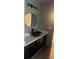 Bathroom features a vessel sink, quartz countertop and modern lighting for a sleek design at 3236 Tallon Sw Ln, Atlanta, GA 30311