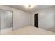Neutral bedroom with soft carpet, gray walls and modern ceiling light fixture at 3236 Tallon Sw Ln, Atlanta, GA 30311