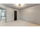 Neutral bedroom with soft carpet, gray walls and modern ceiling light fixture at 3236 Tallon Sw Ln, Atlanta, GA 30311