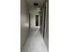 Upstairs hallway featuring carpeted floors and access to multiple rooms at 3236 Tallon Sw Ln, Atlanta, GA 30311