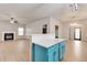 Open floorplan showcasing the living room, kitchen island, and modern flooring at 3236 Tallon Sw Ln, Atlanta, GA 30311