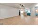 Open-concept space with vinyl plank flooring that connects the living room with the kitchen at 3236 Tallon Sw Ln, Atlanta, GA 30311