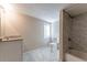 Clean bathroom, featuring a tiled shower and granite countertop at 3235 Mcafee Rd, Decatur, GA 30032