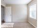 Simple bedroom with carpet, one door, and a window with blinds at 3235 Mcafee Rd, Decatur, GA 30032
