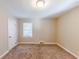 Simple bedroom with carpet flooring and large window at 3235 Mcafee Rd, Decatur, GA 30032