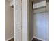Functional closet with built-in shelving and a hanging rod at 3235 Mcafee Rd, Decatur, GA 30032