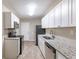 Renovated kitchen featuring modern appliances and granite countertops at 3235 Mcafee Rd, Decatur, GA 30032