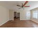Spacious living room with hardwood floors and ceiling fan at 3235 Mcafee Rd, Decatur, GA 30032