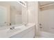 Clean bathroom with double vanity, large mirror, and a shower/tub combo at 3314 Mill Grove Ter, Dacula, GA 30019