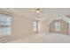 Large bedroom with vaulted ceilings, ceiling fan and carpet flooring at 3314 Mill Grove Ter, Dacula, GA 30019