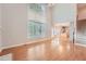 Open floor plan Gathering room with kitchen and staircase views at 3314 Mill Grove Ter, Dacula, GA 30019