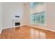 Spacious Gathering room with hardwood floors, fireplace and large windows at 3314 Mill Grove Ter, Dacula, GA 30019