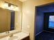 Bathroom with single vanity and mirrored medicine cabinet at 3526 Shepherds Path # 1, Decatur, GA 30034