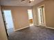 Spacious bedroom with carpet, ceiling fan, and ensuite bathroom at 3526 Shepherds Path # 1, Decatur, GA 30034