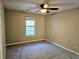 Bright bedroom with carpet, ceiling fan, and window at 3526 Shepherds Path # 1, Decatur, GA 30034
