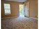 Spacious bedroom with patio access and ceiling fan at 3526 Shepherds Path # 1, Decatur, GA 30034