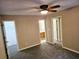 Spacious bedroom with carpet, ceiling fan, and ensuite bathroom at 3526 Shepherds Path # 1, Decatur, GA 30034