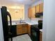 Functional kitchen features updated appliances, tile flooring, and ample cabinet space at 3526 Shepherds Path # 1, Decatur, GA 30034