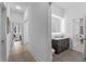 Modern bathroom with sleek vanity, updated fixtures and tile flooring at 775 Juniper Ne St # 103, Atlanta, GA 30308