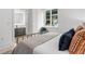 Bright bedroom with a comfortable bed and en-suite bathroom at 775 Juniper Ne St # 103, Atlanta, GA 30308