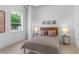 Well-lit bedroom with hardwood floors and neutral tones at 775 Juniper Ne St # 103, Atlanta, GA 30308