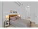 Comfortable bedroom with hardwood floors, neutral decor and natural light at 775 Juniper Ne St # 103, Atlanta, GA 30308