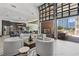 Community room with a fireplace and access to an outdoor patio at 775 Juniper Ne St # 103, Atlanta, GA 30308