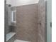 Large walk-in shower with bench and modern tile at 775 Juniper Ne St # 103, Atlanta, GA 30308