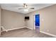 Versatile bedroom with modern flooring, neutral paint, and a ceiling fan at 2994 Ash Grove Dr, Conyers, GA 30094