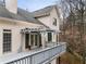 Backyard deck featuring a pergola with outdoor access to the home at 3730 Ashford Ne Pt, Brookhaven, GA 30319