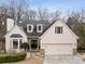 Charming single-Gathering home featuring a well-manicured lawn and a two-car garage at 3730 Ashford Ne Pt, Brookhaven, GA 30319
