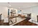 Inviting loft space with hardwood floors, comfortable seating, built-in bar, and ample natural light, perfect for relaxing or entertaining at 3730 Ashford Ne Pt, Brookhaven, GA 30319
